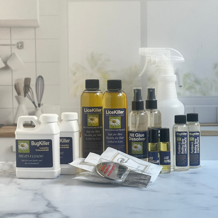 LiceKiller Medium Kit with two of each formula, a sprayer bottle, one premium metal lice comb, and packaged shower caps.